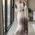 White & lavender faux georgette readymade suit with embroidery & diamond work