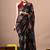 Women's black block print georgette saree with unstitched piece