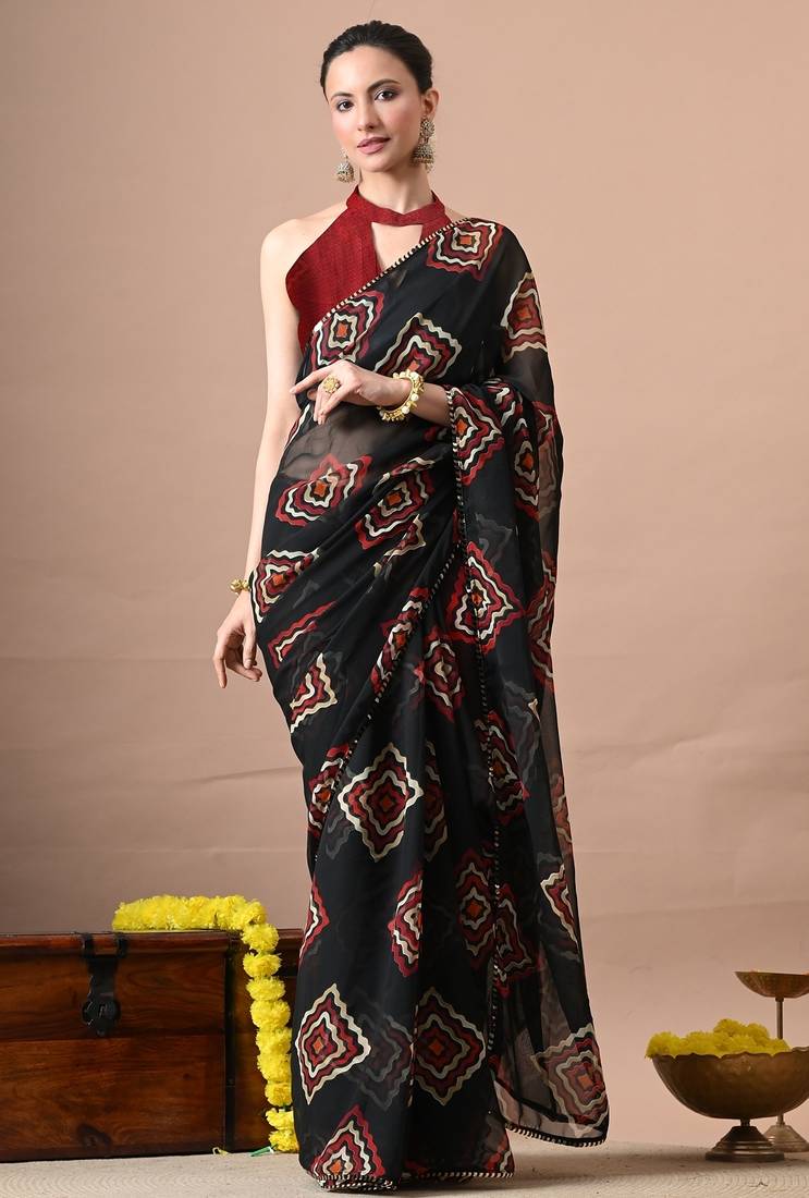 Women's black block print georgette saree with unstitched piece