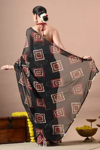 Women's black block print georgette saree with unstitched piece