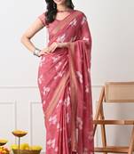 Women's coral floral print georgette saree with unstitched piece