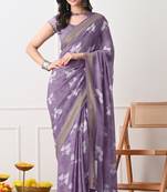 Women's purple floral print georgette saree with unstitched piece