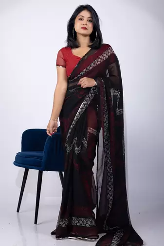 Women's black chevron print georgette saree with unstitched piece