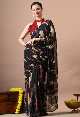 Women's black abstract print georgette saree with unstitched piece 1