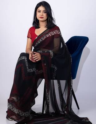 Women's black chevron print georgette saree with unstitched piece 3