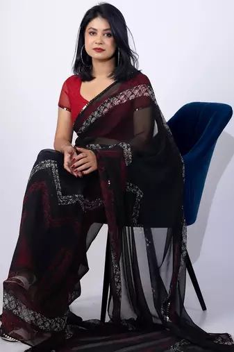 Women's black chevron print georgette saree with unstitched piece
