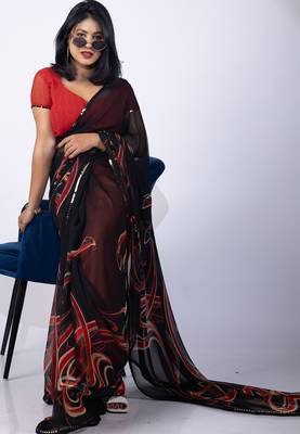 Women's black geometric print georgette saree with unstitched piece 2