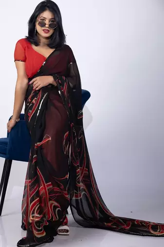 Women's black geometric print georgette saree with unstitched piece