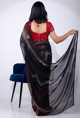 Women's black chevron print georgette saree with unstitched piece 4