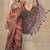 Women's orange floral cotton blend saree with unstitched piece