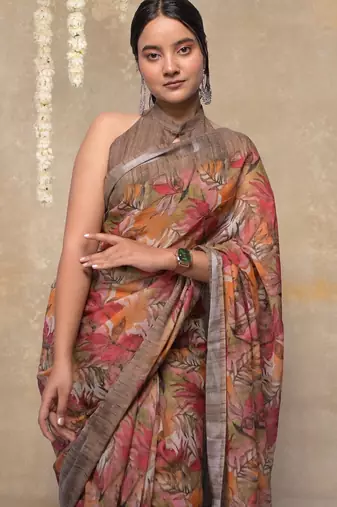Women's orange floral cotton blend saree with unstitched piece