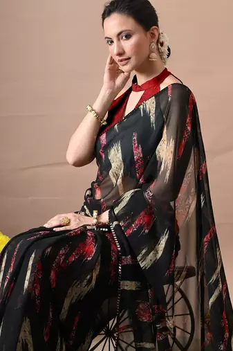 Women's black abstract print georgette saree with unstitched piece