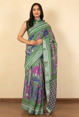 Women's green ikkat print cotton silk blend saree with unstitched piece 1