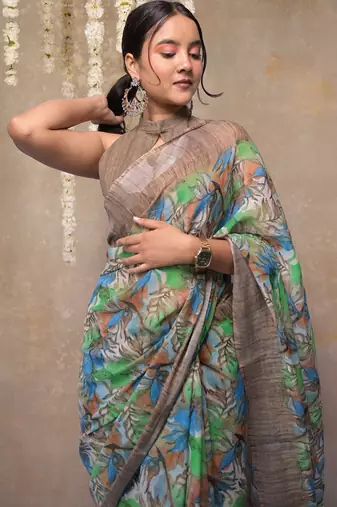 Women's green floral cotton blend saree with unstitched piece