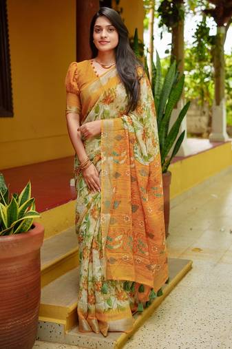 Women's yellow floral cotton blend saree with unstitched piece
