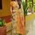 Women's yellow floral cotton blend saree with unstitched piece