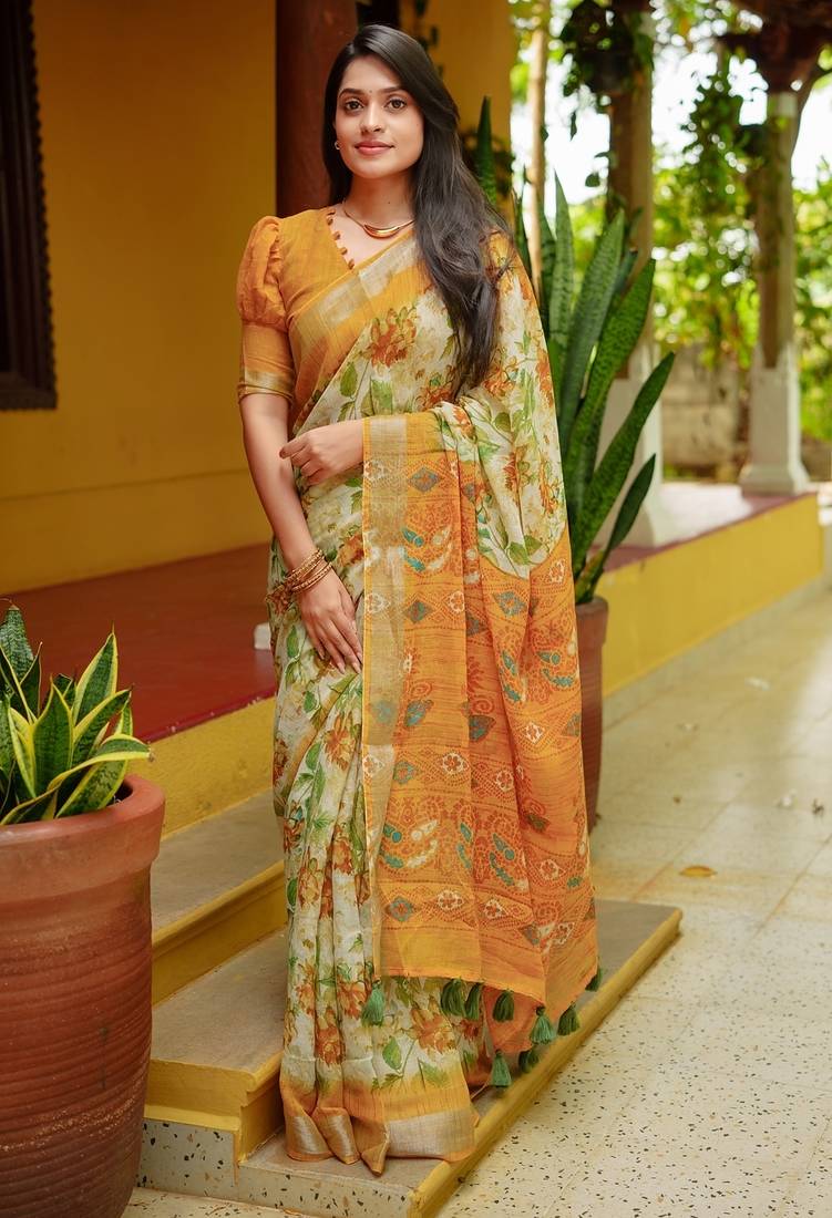 Women's yellow floral cotton blend saree with unstitched piece