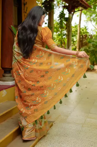 Women's yellow floral cotton blend saree with unstitched piece