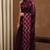Women's maroon chevron/zig zag print chiffon saree with unstitched piece