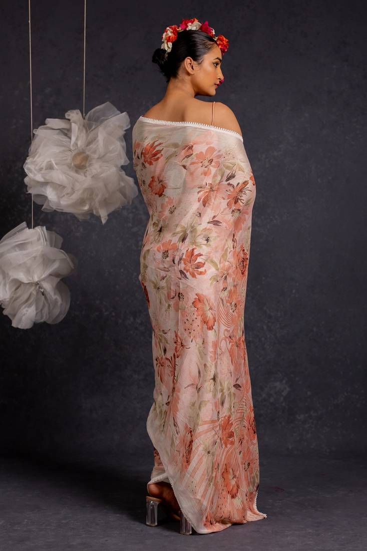 Women's peach floral print chiffon saree with unstitched piece