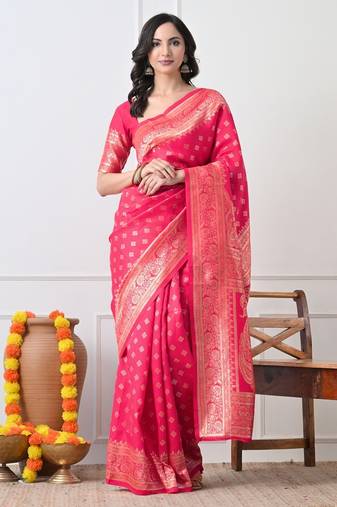 Women's pink woven design silk blend saree with unstitched piece