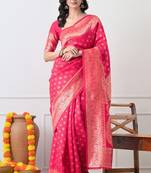 Women's pink woven design silk blend saree with unstitched piece