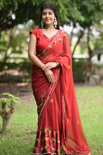 Women's red floral stripes print georgette saree with unstitched piece