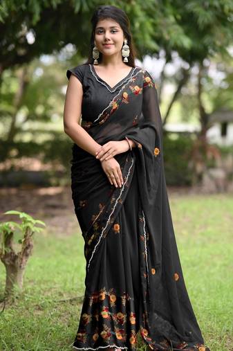 Women's black floral stripes print georgette saree with unstitched piece