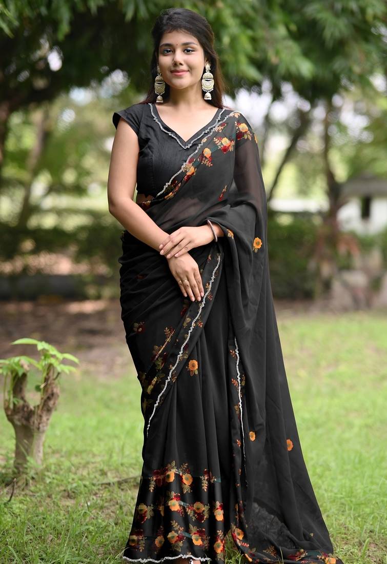 Women's black floral stripes print georgette saree with unstitched piece
