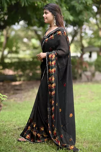 Women's black floral stripes print georgette saree with unstitched piece