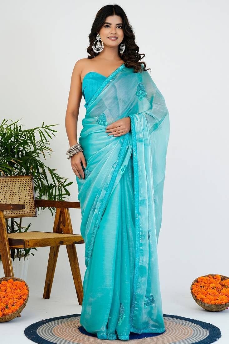 Women's turquoise solid organza saree with unstitched piece