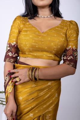 Women's mustard zari woven stripes cotton silk blend saree with unstitched piece 5