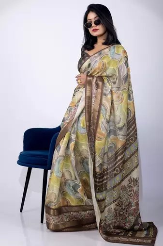 Women's green geometric print cotton silk blend saree with unstitched piece