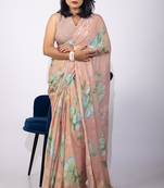 Women's peach floral print chiffon saree with unstitched piece