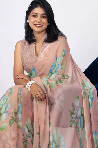 Women's peach floral print chiffon saree with unstitched piece