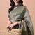 Women's green floral print cotton blend saree with unstitched piece