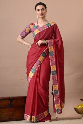 Women's red embellished georgette saree with unstitched piece 1