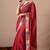 Women's red embellished georgette saree with unstitched piece