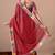 Women's red embellished georgette saree with unstitched piece