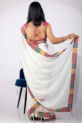 Women's white embellished georgette saree with unstitched piece 3