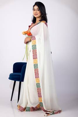 Women's white embellished georgette saree with unstitched piece 4