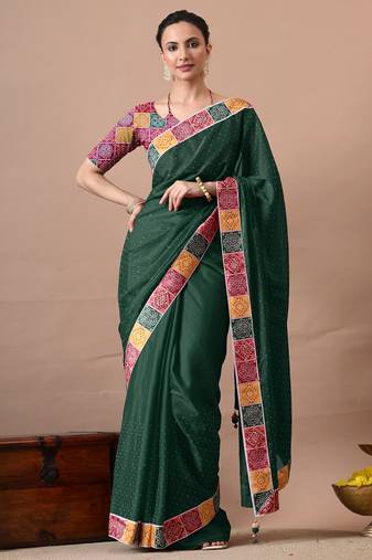 Women's green embellished georgette saree with unstitched piece