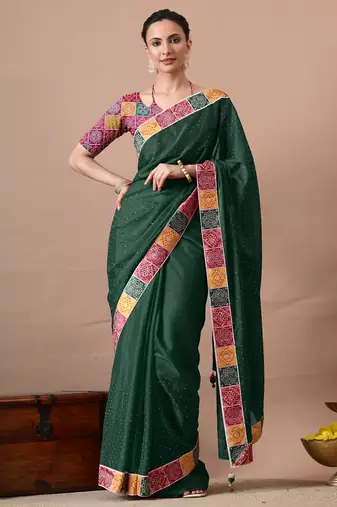 Women's green embellished georgette saree with unstitched piece