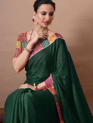 Women's green embellished georgette saree with unstitched piece 4