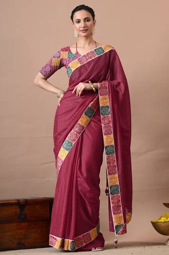 Women's maroon embellished georgette saree with unstitched piece
