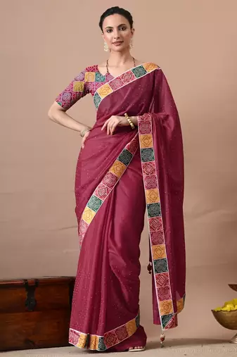 Women's maroon embellished georgette saree with unstitched piece