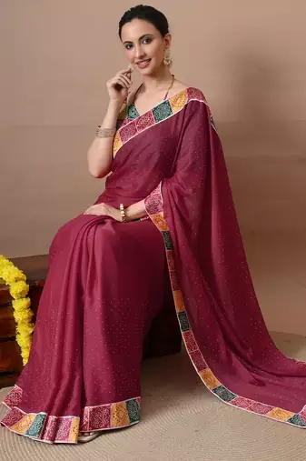 Women's maroon embellished georgette saree with unstitched piece