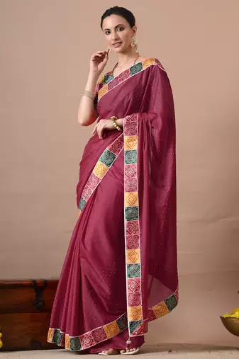 Women's maroon embellished georgette saree with unstitched piece