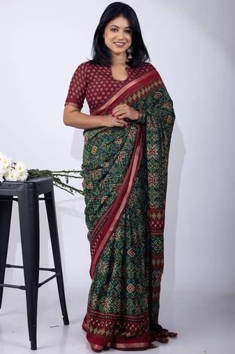women's green patola viscose saree with unstitched piece