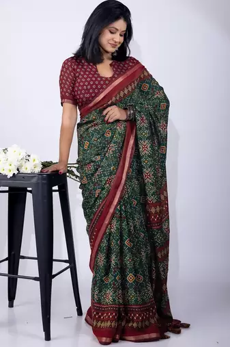 women's green patola viscose saree with unstitched piece
